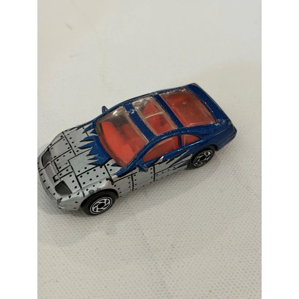 Matchbox Superfast #61 Blue Nissan 300ZX Diecast Car 1:64 Silver Metal Print